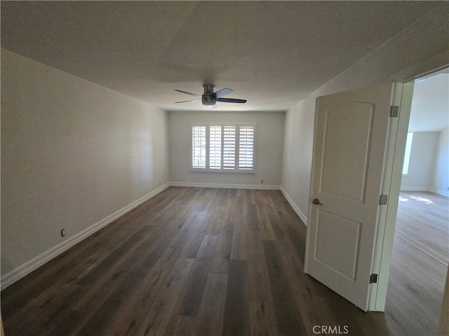 10281 Kings St, Los Alamitos, CA 90720 - unfurnished room featuring a ceiling fan and dark wood finished floors