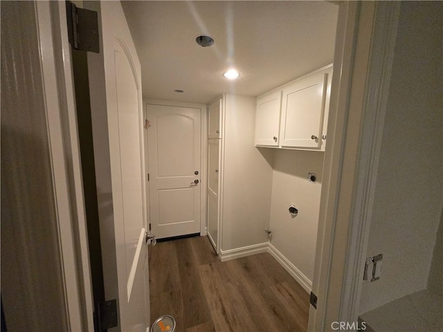 10281 Kings St, Los Alamitos, CA 90720 - washroom with dark wood-style floors, electric dryer hookup, cabinet space, and recessed lighting