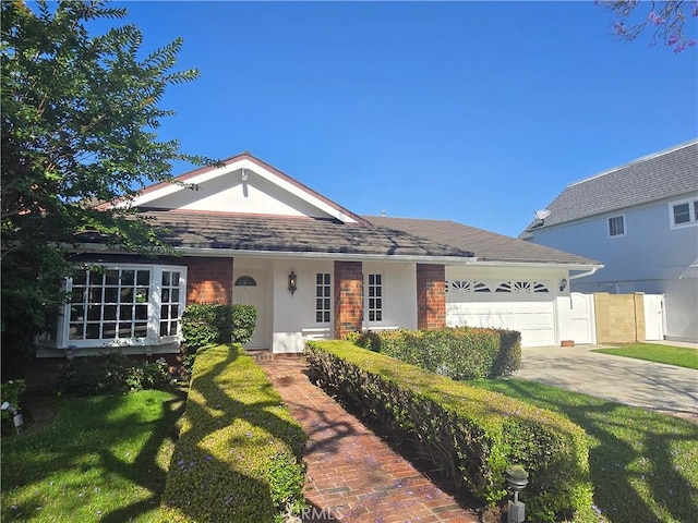 10281 Kings St, Los Alamitos, CA 90720 - single story home with a garage, driveway, a front lawn, and stucco siding