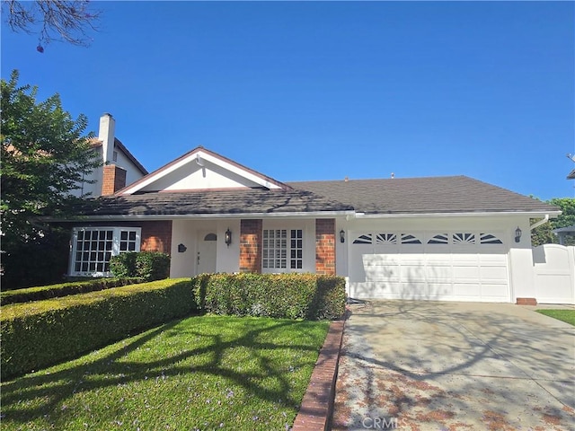 10281 Kings St, Los Alamitos, CA 90720 - ranch-style home featuring a garage, a front yard, and driveway