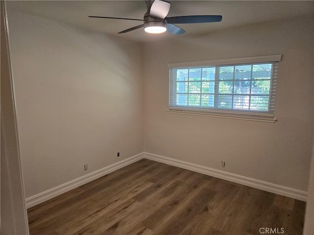 10281 Kings St, Los Alamitos, CA 90720 - spare room with dark wood finished floors and ceiling fan