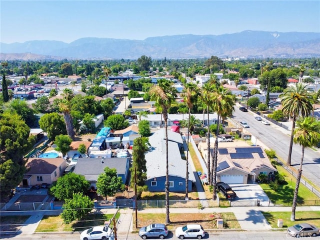 188 E 11th St Unit 1-4, San Bernardino, CA 92410 - aerial perspective of suburban area featuring a mountain backdrop