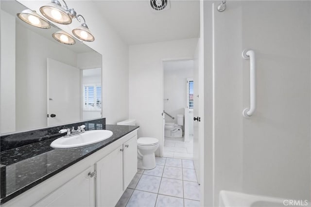 10519 La Rosa Cir, Fountain Valley, CA 92708 - bathroom featuring healthy amount of natural light, vanity, and tile patterned flooring