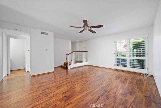 10519 La Rosa Cir, Fountain Valley, CA 92708 - spare room with wood finished floors, a ceiling fan, and stairway