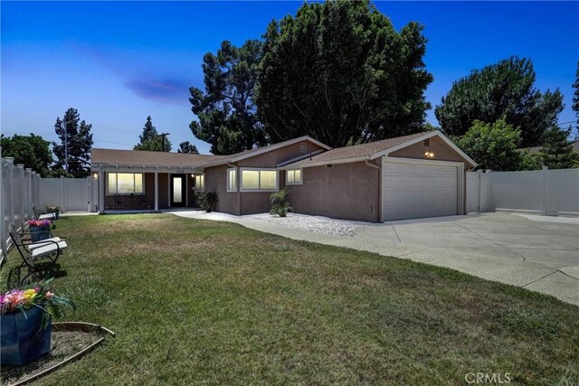 17106 Donmetz St, Granada Hills, CA 91344 - ranch-style house featuring a garage, concrete driveway, and stucco siding
