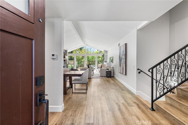 11212 Brunswick Way N, Tustin, CA 92705 - entryway featuring light wood-type flooring and stairs