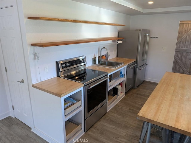 4020 F St, Eureka, CA 95503 - kitchen featuring stainless steel appliances, open shelves, wood counters, dark wood finished floors, and recessed lighting
