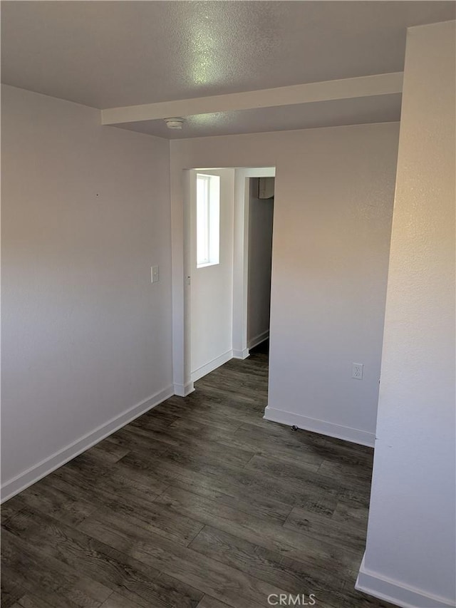 4020 F St, Eureka, CA 95503 - empty room with dark wood finished floors and a smoke detector