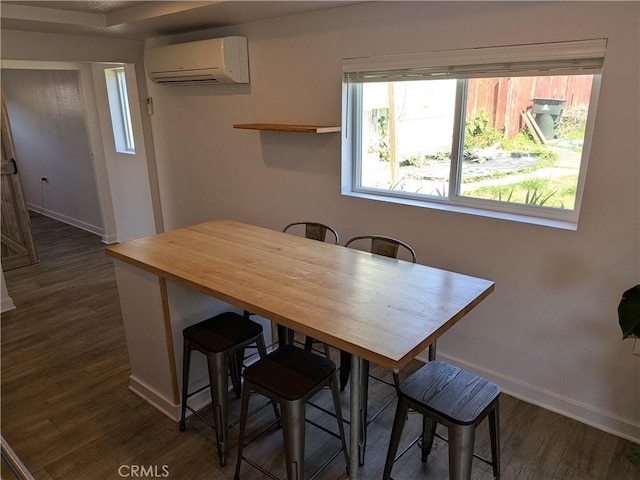4020 F St, Eureka, CA 95503 - dining area featuring an AC wall unit and dark wood-type flooring