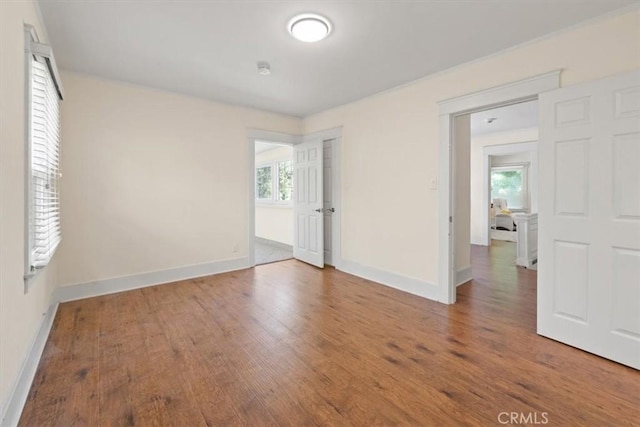268 S Norton Ave, Los Angeles, CA 90004 - empty room with wood finished floors and baseboards