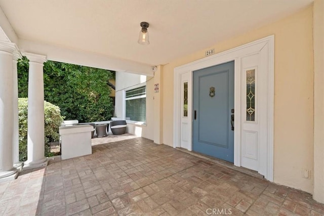 268 S Norton Ave, Los Angeles, CA 90004 - property entrance featuring stucco siding and a patio area