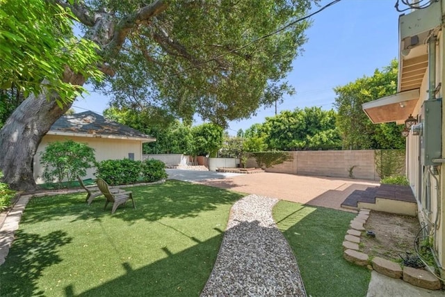 268 S Norton Ave, Los Angeles, CA 90004 - fenced backyard with a patio area