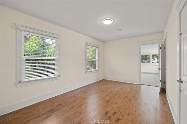268 S Norton Ave, Los Angeles, CA 90004 - unfurnished room with hardwood / wood-style flooring and baseboards