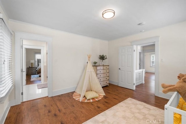 268 S Norton Ave, Los Angeles, CA 90004 - playroom with wood finished floors and baseboards