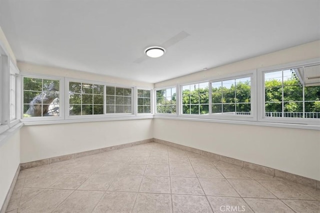 268 S Norton Ave, Los Angeles, CA 90004 - unfurnished sunroom with plenty of natural light and tile patterned flooring