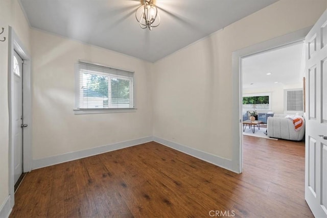 268 S Norton Ave, Los Angeles, CA 90004 - unfurnished room with healthy amount of natural light and wood finished floors