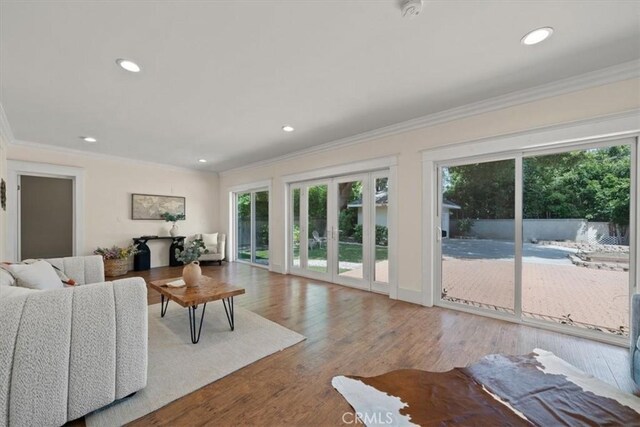 268 S Norton Ave, Los Angeles, CA 90004 - living area featuring healthy amount of natural light, ornamental molding, recessed lighting, and wood finished floors