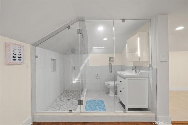 268 S Norton Ave, Los Angeles, CA 90004 - full bathroom featuring vanity, tile patterned flooring, a shower stall, and vaulted ceiling