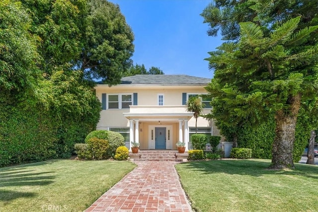 268 S Norton Ave, Los Angeles, CA 90004 - view of front of home with stucco siding and a front lawn