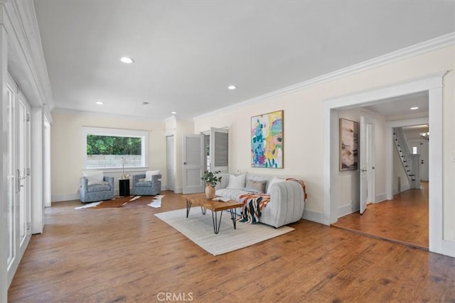 268 S Norton Ave, Los Angeles, CA 90004 - living room featuring ornamental molding, wood finished floors, recessed lighting, and stairs