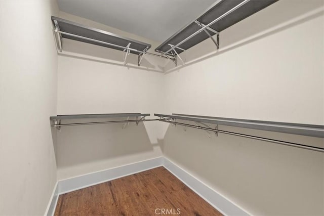 268 S Norton Ave, Los Angeles, CA 90004 - spacious closet with dark wood finished floors