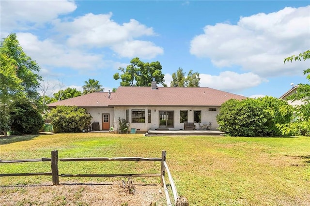 512 S Crawford Ave, Willows, CA 95988 - back of property with a patio area and stucco siding
