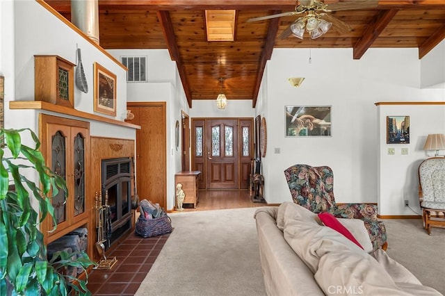 512 S Crawford Ave, Willows, CA 95988 - carpeted living room featuring wooden ceiling, a ceiling fan, and a fireplace with flush hearth
