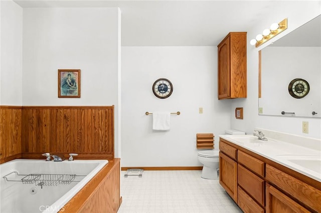 512 S Crawford Ave, Willows, CA 95988 - full bathroom featuring double vanity, a whirlpool tub, and tile patterned floors