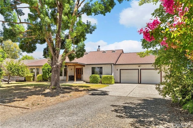 512 S Crawford Ave, Willows, CA 95988 - single story home with an attached garage, driveway, and stucco siding
