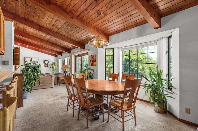 512 S Crawford Ave, Willows, CA 95988 - dining space featuring light colored carpet, wood ceiling, healthy amount of natural light, and a chandelier