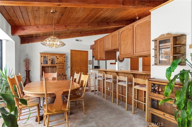 512 S Crawford Ave, Willows, CA 95988 - dining room featuring wooden ceiling, light carpet, and a chandelier