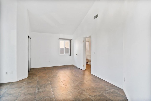1837 Avenida Sevilla, Oceanside, CA 92056 - spare room with stone finish flooring and high vaulted ceiling