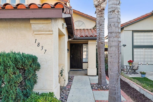 1837 Avenida Sevilla, Oceanside, CA 92056 - property entrance featuring stucco siding and a tile roof
