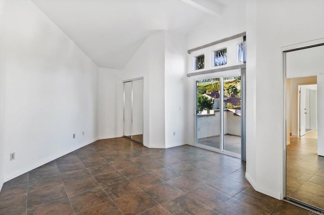 1837 Avenida Sevilla, Oceanside, CA 92056 - empty room featuring high vaulted ceiling and beamed ceiling
