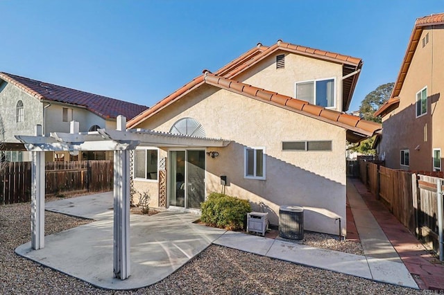 1837 Avenida Sevilla, Oceanside, CA 92056 - back of property featuring stucco siding, a pergola, a tiled roof, and a patio