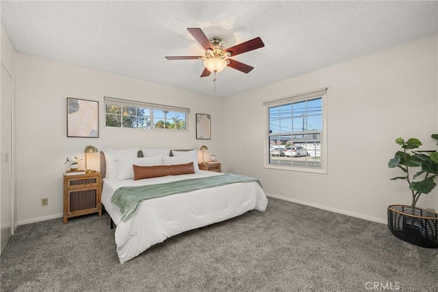 12751 9th St, Garden Grove, CA 92840 - carpeted bedroom with multiple windows, a textured ceiling, and a ceiling fan