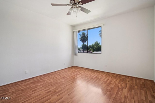 7211 Cozycroft Ave Unit 40, Winnetka, CA 91306 - empty room with wood finished floors and a ceiling fan