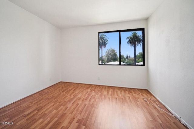 7211 Cozycroft Ave Unit 40, Winnetka, CA 91306 - spare room with wood finished floors and baseboards