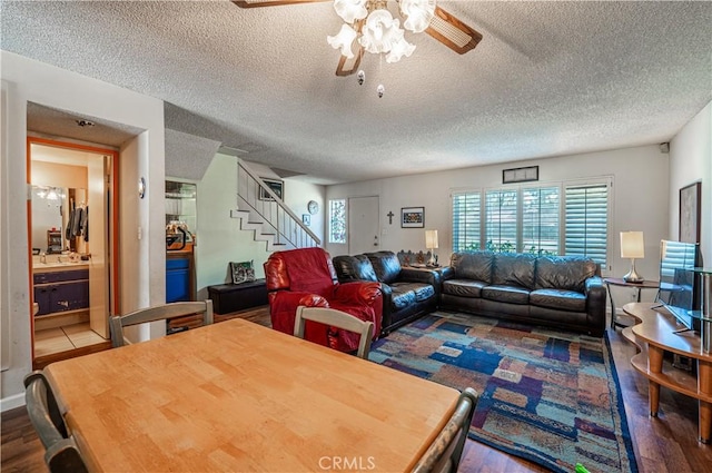 9739 Reseda Blvd Unit 36, Northridge, CA 91324 - dining room with a ceiling fan, a textured ceiling, stairway, and wood finished floors
