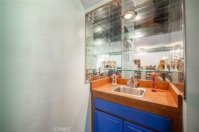 9739 Reseda Blvd Unit 36, Northridge, CA 91324 - indoor wet bar featuring a textured wall