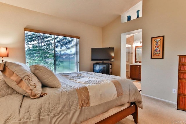 11368 Via Rancho San Diego Unit C, El Cajon, CA 92019 - bedroom featuring light colored carpet, vaulted ceiling, and ensuite bath