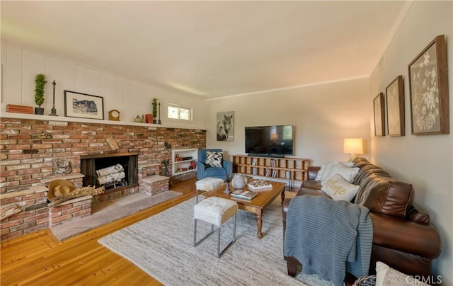 430 N Canyon Blvd, Monrovia, CA 91016 - living room with wood finished floors and a brick fireplace