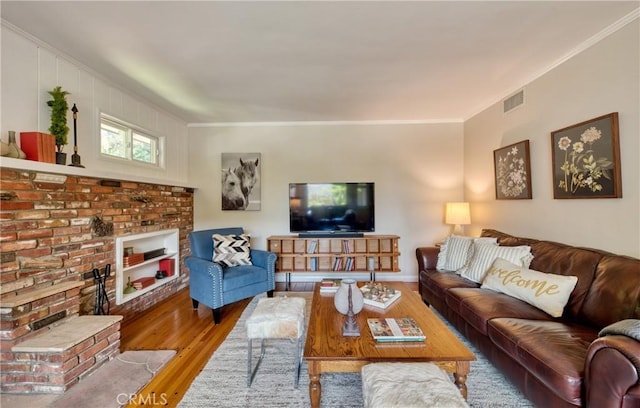 430 N Canyon Blvd, Monrovia, CA 91016 - living area featuring ornamental molding, wood finished floors, and a fireplace