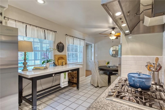 430 N Canyon Blvd, Monrovia, CA 91016 - kitchen featuring stainless steel gas cooktop, ceiling fan, light tile patterned flooring, extractor fan, and recessed lighting