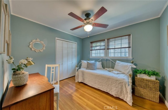 430 N Canyon Blvd, Monrovia, CA 91016 - bedroom featuring light wood-type flooring, a closet, ornamental molding, and a ceiling fan