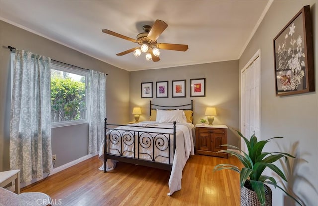430 N Canyon Blvd, Monrovia, CA 91016 - bedroom featuring wood finished floors, crown molding, a closet, and ceiling fan