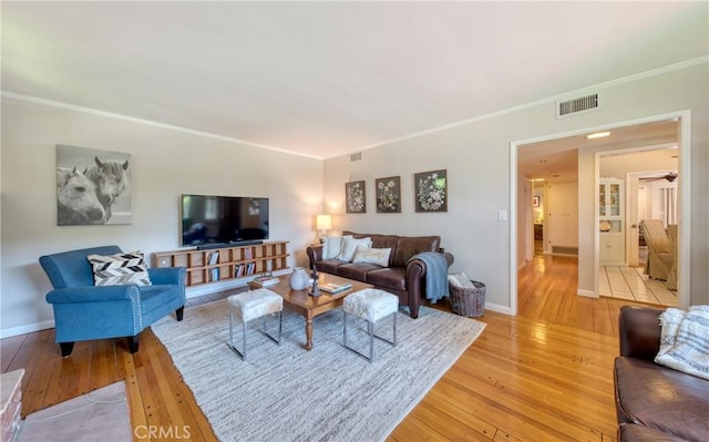 430 N Canyon Blvd, Monrovia, CA 91016 - living area featuring light wood finished floors and ornamental molding