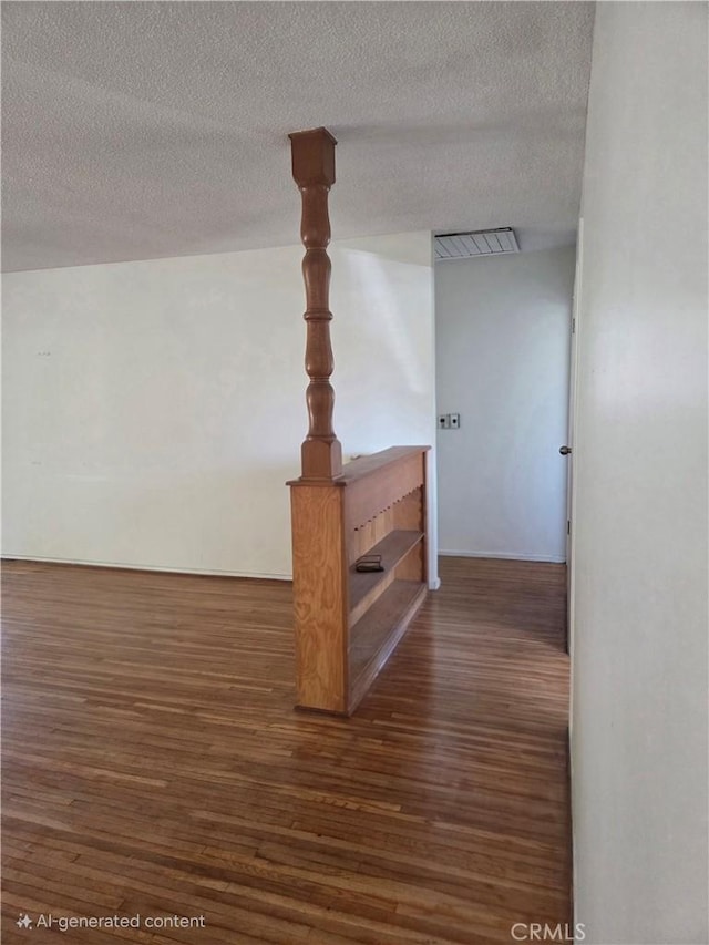 11505 Elmhurst Dr, Norwalk, CA 90650 - corridor featuring wood finished floors and a textured ceiling