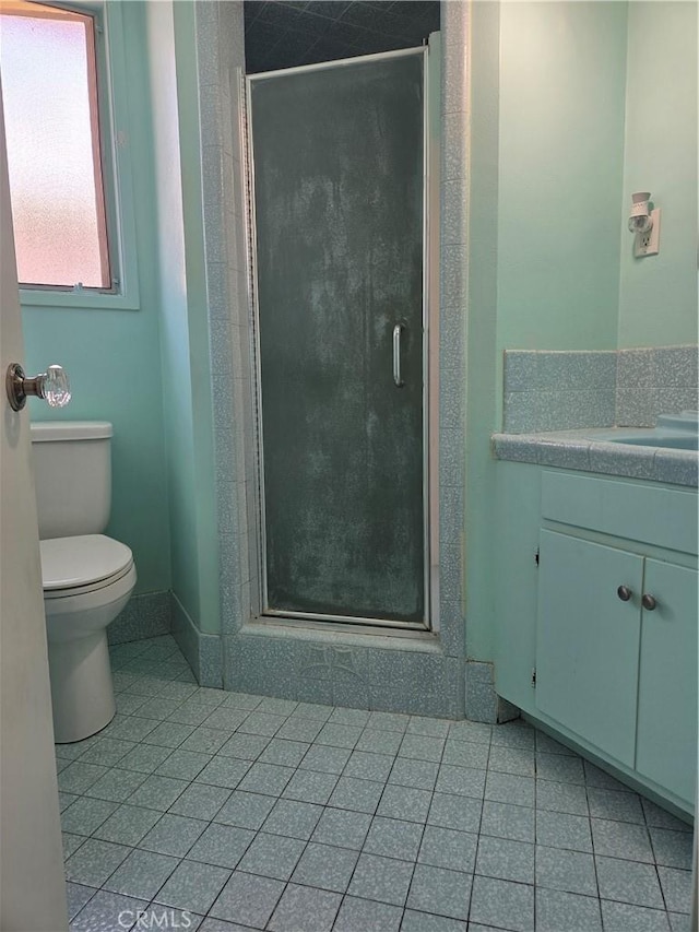 11505 Elmhurst Dr, Norwalk, CA 90650 - bathroom featuring vanity, a stall shower, and tile patterned floors