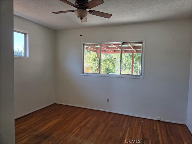 11505 Elmhurst Dr, Norwalk, CA 90650 - empty room featuring plenty of natural light, wood finished floors, a ceiling fan, and a textured ceiling